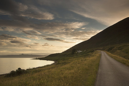 A road along the coast at sunset;Applecross peninsula highlands scotland