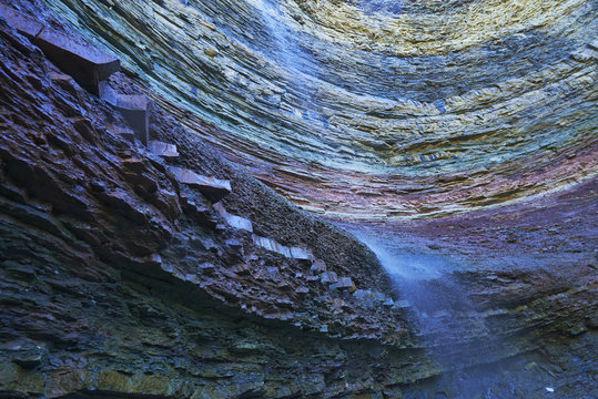 Stratified rock segments with waterfall; Stoney Creek, Ontario, Canada