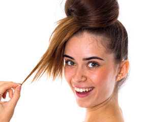 Obraz premium Woman with hair in a bun smiling 