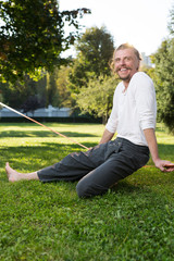 Fototapeta premium Slacklining is a practice in balance that typically uses nylon o
