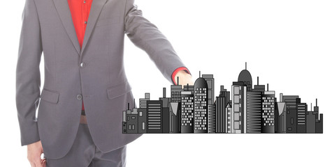 Young businessman with city skyline isolated on white background