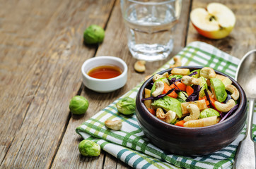 Brussels sprouts red cabbage carrot cashew apple salad with mapl