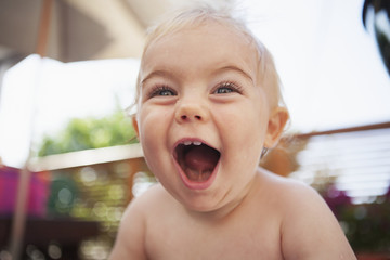 Baby boy with excited expression