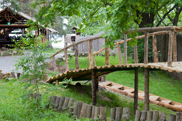 Humpback bridge in the forest.