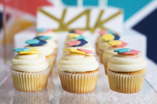 Rows of cupcakes on dessert table; Toronto, Ontario, Canada