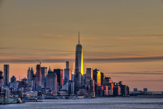 Sunset over Lower Manhattan and the World Trade Centre; New York City, New York, United States of America