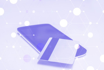 Payment for services. Wireless connection background. Credit card and mobile phone on the table.