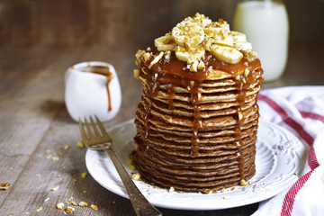 Chocolate ombre pancakes with banana,walnuts and caramel.