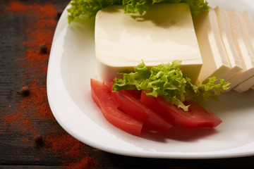 mozzarella cheese on a table bacground