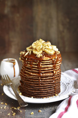 Chocolate ombre pancakes with banana,walnuts and caramel.