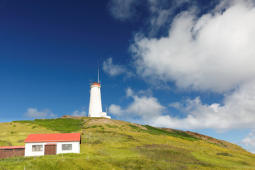 Fototapeta na wymiar Reykjanes Lighthouse Near Reykjavik, Iceland. The lighthouse was built in 1907-1908 on Baejarfell hill in Reykjanes.