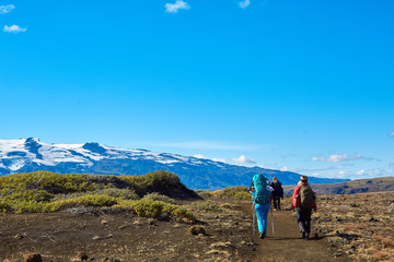 Fototapeta premium woman hikers on the trail, hiking in Iceland