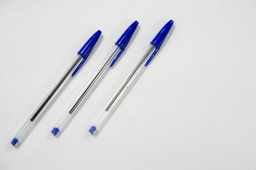 blue pen on white background