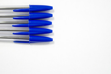 blue pen on white background
