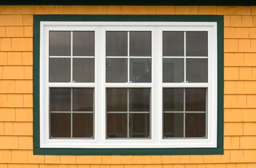 Fototapeta na wymiar Window on orange wall