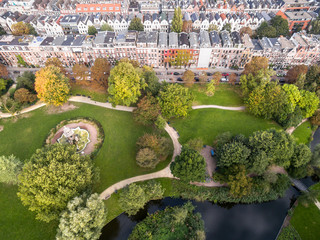 Aerial view of Amsterdam city roofs beside Sarphati park  - 124296726