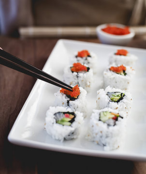 Sushi with tobiko roe.