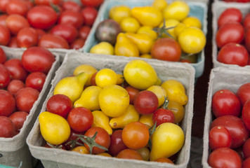 Containers of cherry tomatoes.