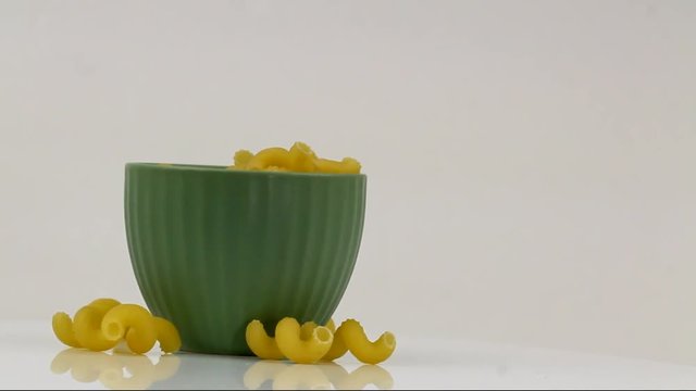 Rotating Cavatappi pasta in a bowl