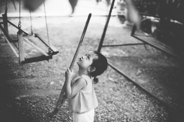 Thai cute child 's gonna get a couple of mangoes. , B&W Style