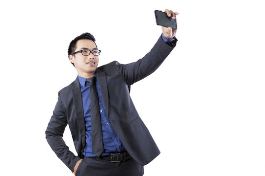 Businessman taking a selfie picture
