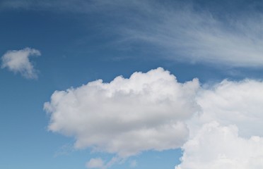 Naklejka na ściany i meble Blue sky background with white cloud, white cloud in the blue sky 