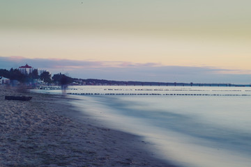 Breakwaters in the Baltic sea over the sunset