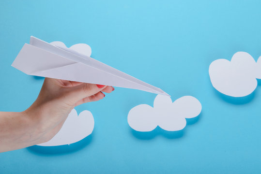 Paper plane, blue background