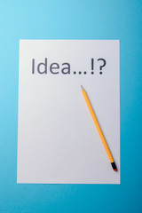 Idea word on white paper