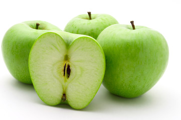 Four apples with one half iIsolated on white background