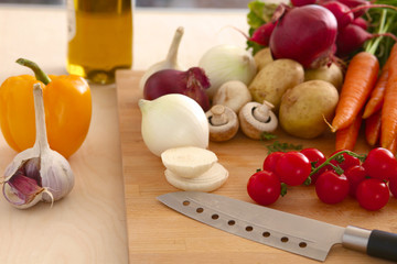Pile of organic vegetables on a wooden table