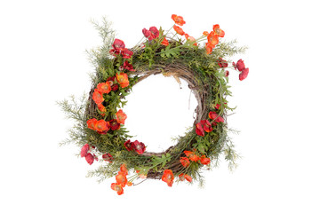 Autumn wreath with fresh foliage and flowers