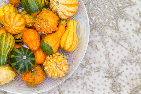 Table centerpiece with ornamental pumpkins