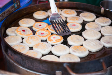 making chinese cake for sale in market