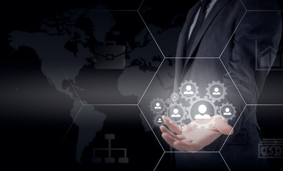 Hand carrying businessman icon network - HR,HRM,MLM, teamwork and leadership concept