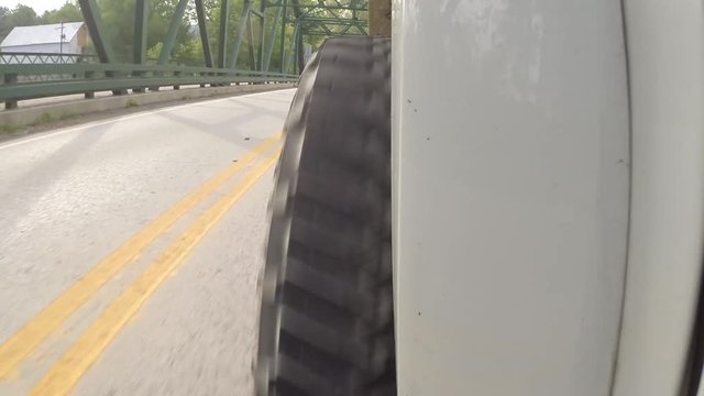 Jeep trail rides, a truck drives over a small bridge.