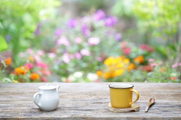white vintage  teapot  with yellow mug