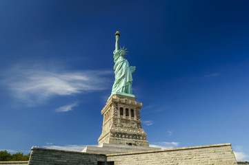 Fototapeta premium Statue of Liberty on Liberty Island on a sunny day, HDR, New York City, USA
