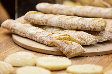 Chiabatta with olives lying on the counter for confectionery sho