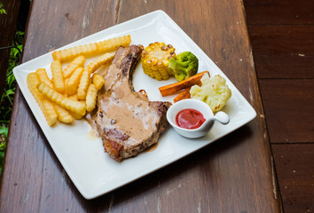Pork steak, potato and vegetables