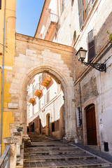 historical city gate, and narrow streets in the old town of Chie