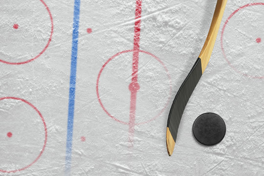 Stick, puck and hockey field with markings