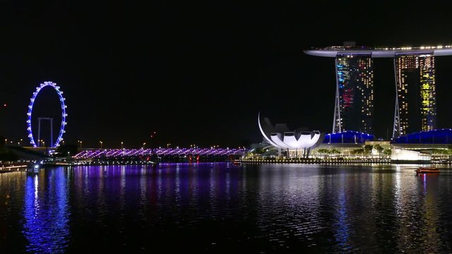 Aerial view of Singapore city skyline at night at Marina Bay, Singapore