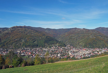 Fototapeta na wymiar View from a mountain pasture on the valley of the river Tisa and the town Rakhiv