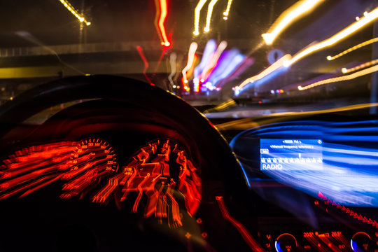 Drunk Driver Goes At Night. View From Inside. Abstract