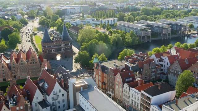 Arial view from the Saint Petri Church tower over the city, Lubeck, Germany. Panning shot
