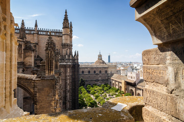 Sunny view of inner garden of Cathedral from viewpoint of Giralda in Sevilla, Andalusia province, Spain.