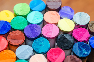 Set of different colored pastel chalk combined together.