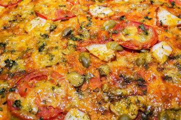 Obraz na płótnie Canvas slices of pizza macro background with different fillings