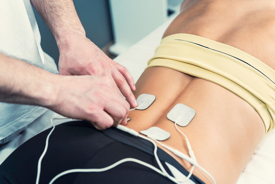 Electrodes in physical therapy of lower back